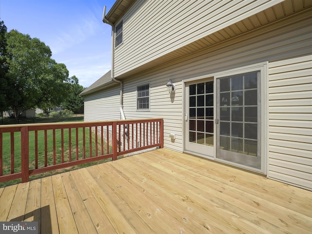 deck featuring a yard