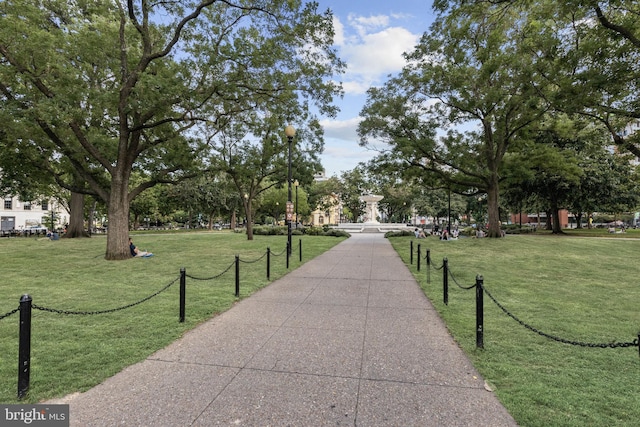 surrounding community featuring a lawn