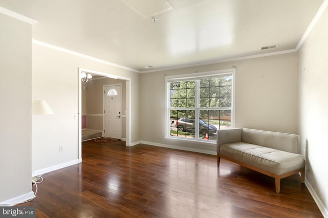 unfurnished room featuring crown molding and hardwood / wood-style floors