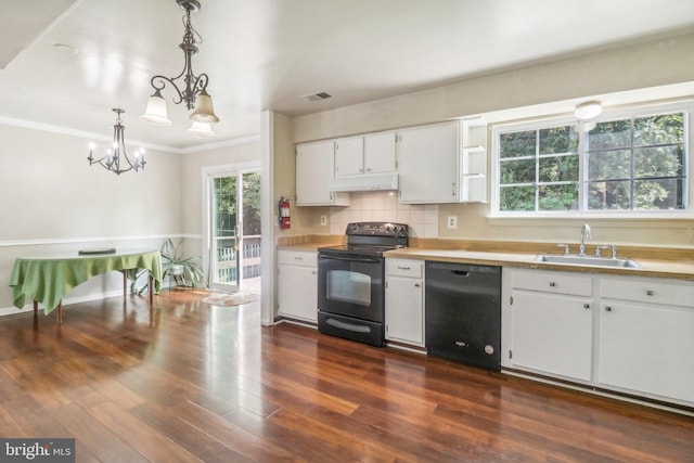 kitchen featuring white cabinetry, tasteful backsplash, black appliances, pendant lighting, and dark wood-type flooring