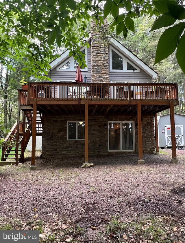 back of property with a deck