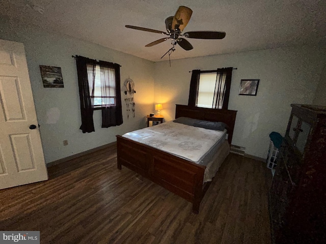 bedroom with ceiling fan and hardwood / wood-style flooring