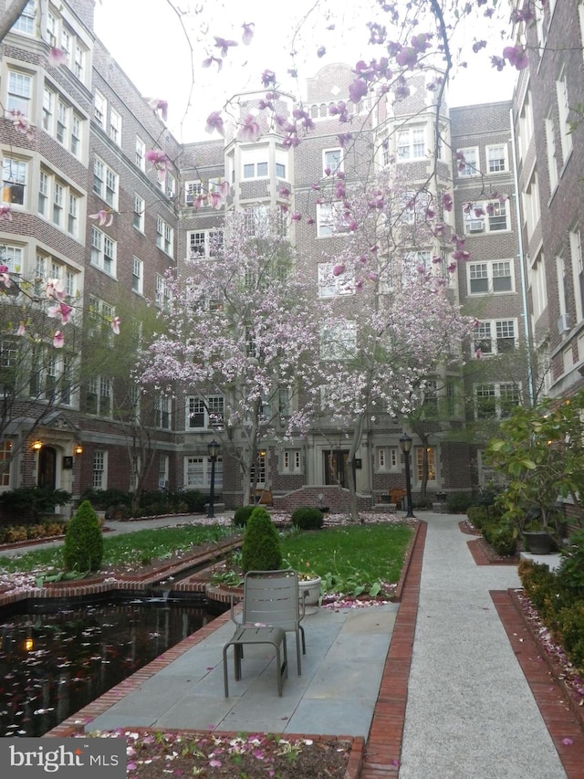 view of home's community featuring a water view