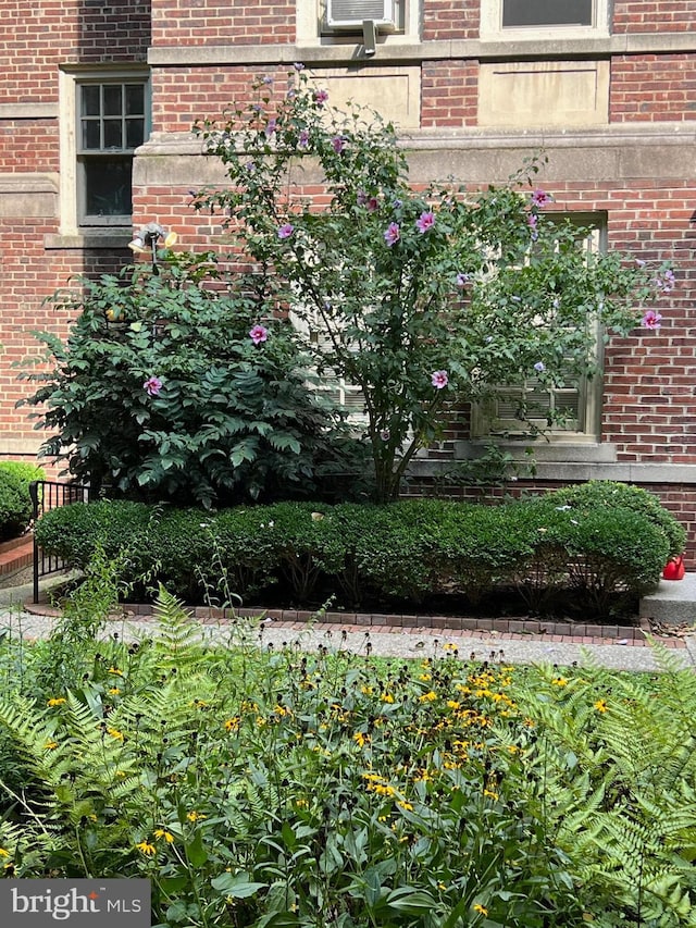 property entrance with brick siding