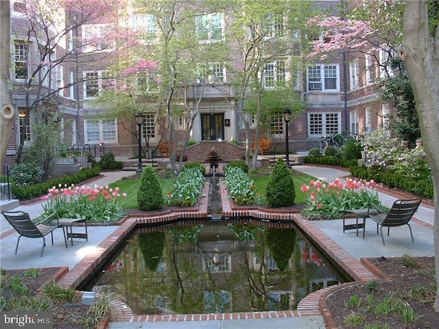 view of home's community featuring a patio