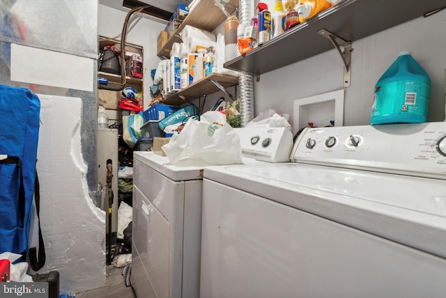 laundry room with washer and dryer