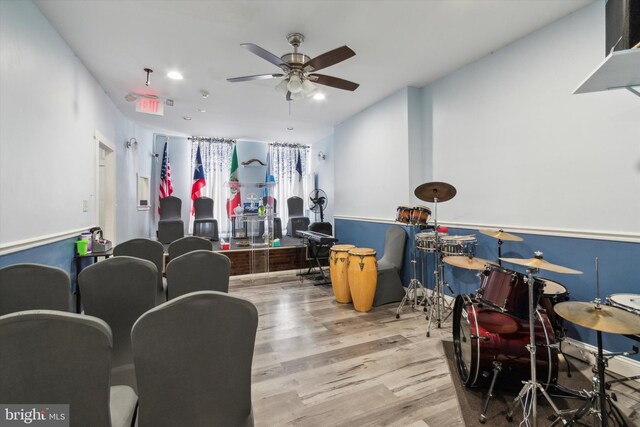 playroom featuring ceiling fan and light hardwood / wood-style floors