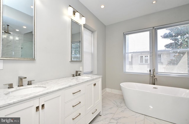 bathroom featuring vanity and plus walk in shower