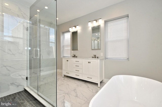 bathroom featuring independent shower and bath and vanity