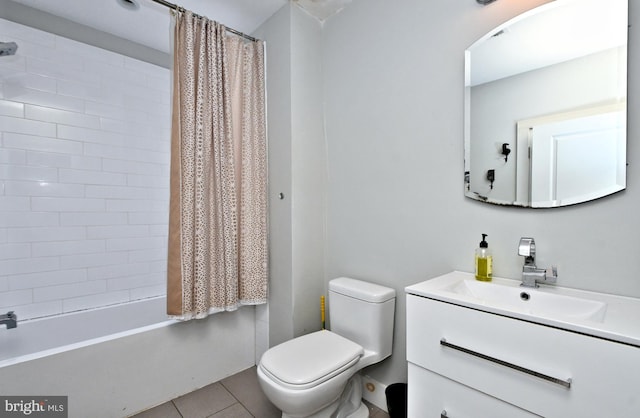 full bathroom with tile patterned floors, shower / bathtub combination with curtain, toilet, and vanity