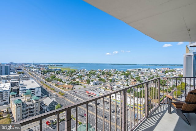 balcony featuring a water view