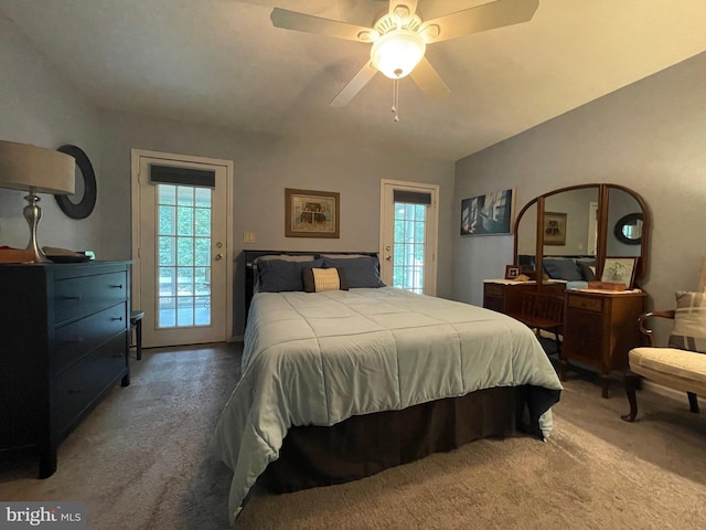 carpeted bedroom with multiple windows, access to outside, and ceiling fan