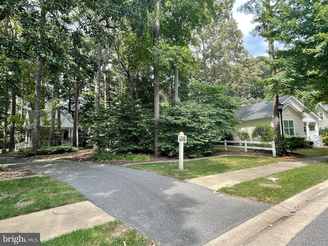 view of front of house with fence