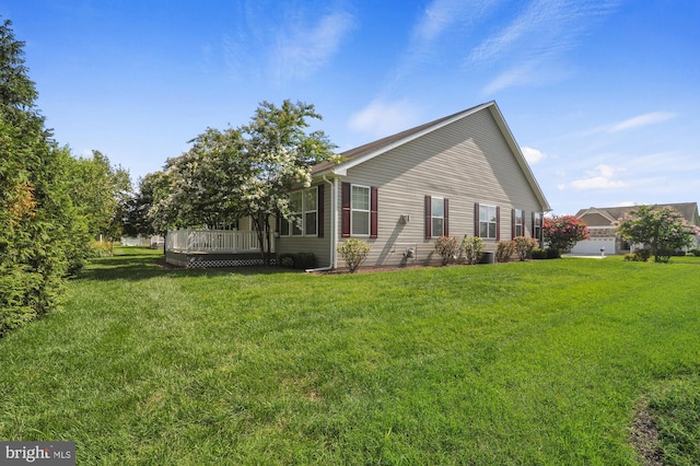 view of home's exterior featuring a yard