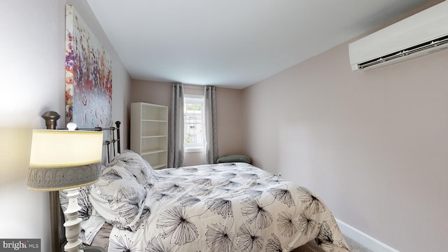 carpeted bedroom featuring a wall mounted air conditioner