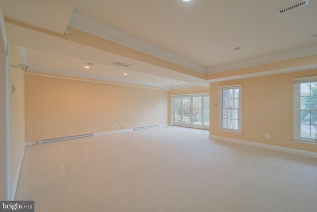 spare room with light carpet, a baseboard radiator, visible vents, and crown molding