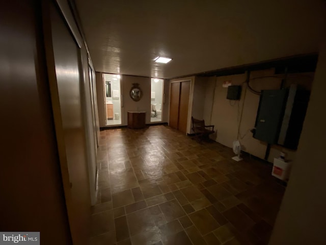 corridor with dark tile patterned floors