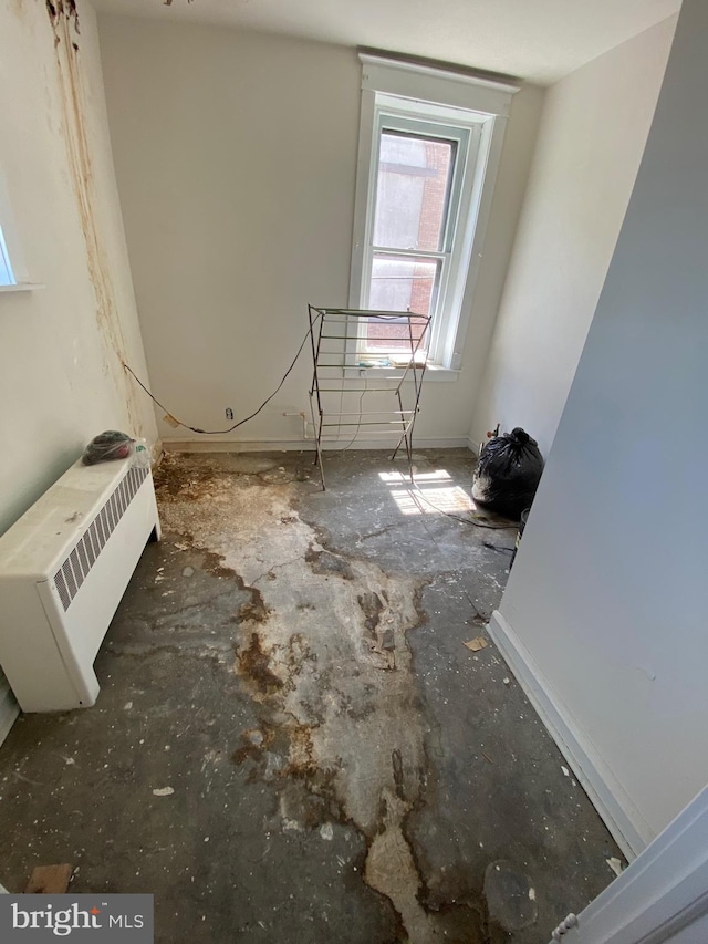 empty room featuring radiator