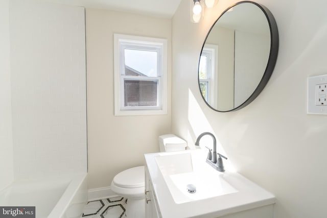 full bathroom with vanity, toilet, and  shower combination