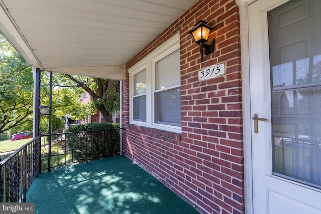 view of patio featuring a porch