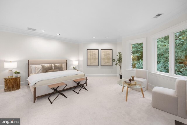 carpeted bedroom with multiple windows and crown molding