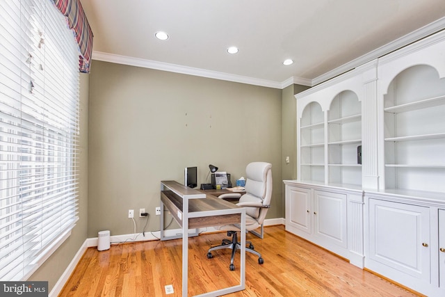 home office featuring ornamental molding and light wood-type flooring