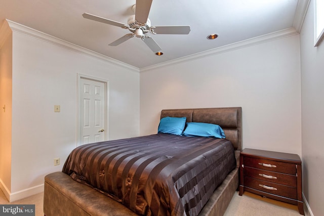 carpeted bedroom featuring crown molding and ceiling fan