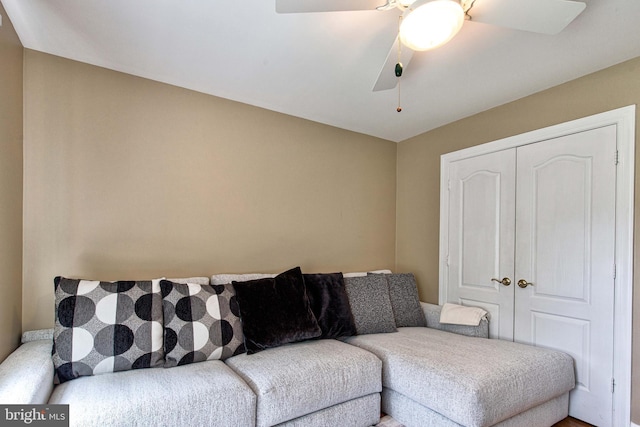 living room with ceiling fan