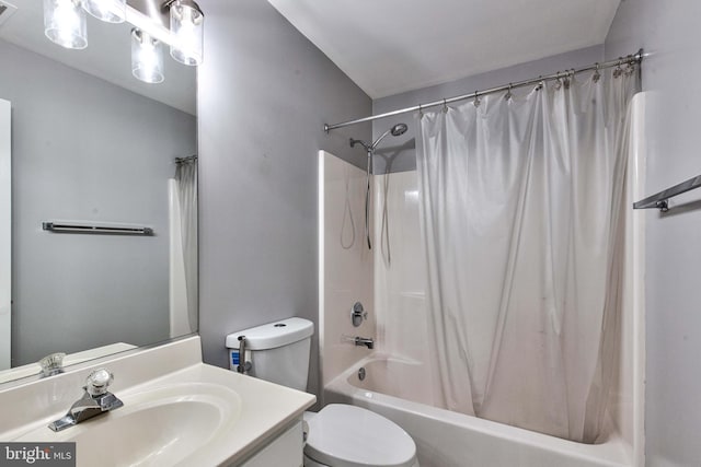 full bathroom with toilet, vanity, and shower / bathtub combination with curtain