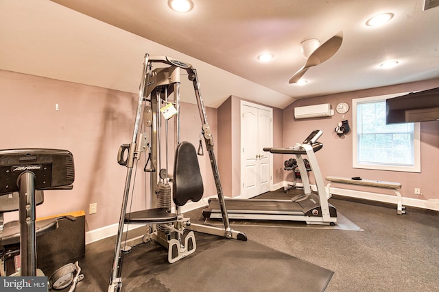 workout room with a wall mounted air conditioner