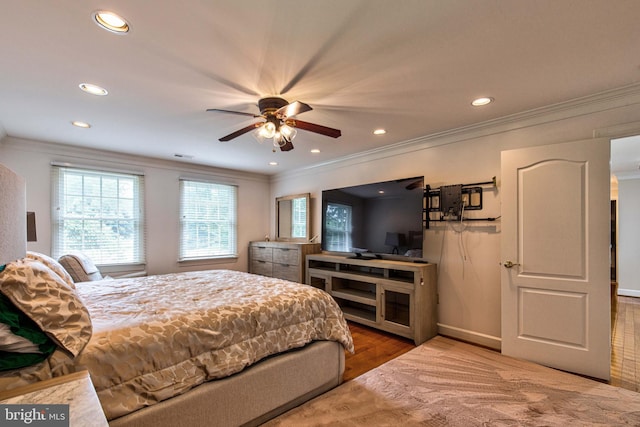 bedroom featuring crown molding and hardwood / wood-style floors