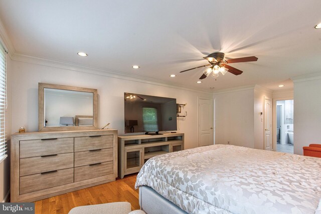 bedroom featuring hardwood / wood-style flooring and ornamental molding