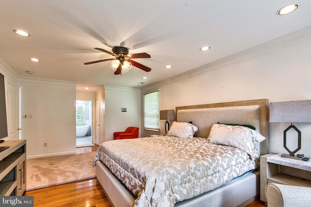 bedroom with crown molding and wood-type flooring