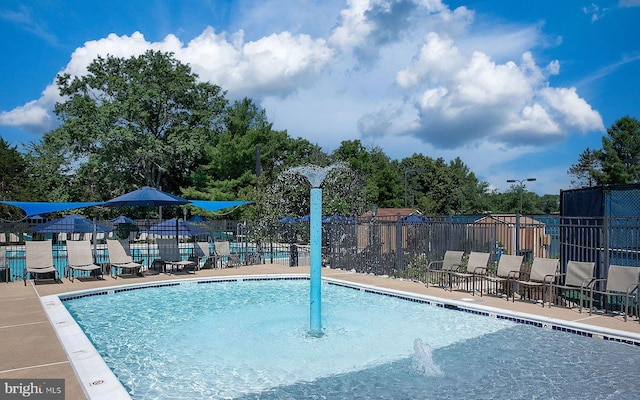 view of pool featuring pool water feature