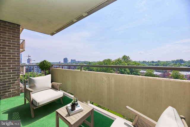 balcony featuring a city view