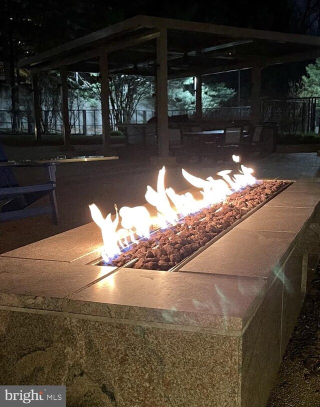 view of patio / terrace with an outdoor fire pit