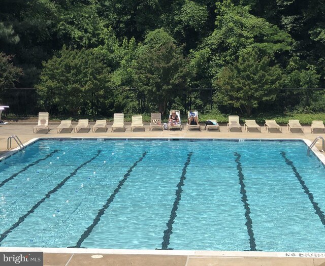 community pool with fence