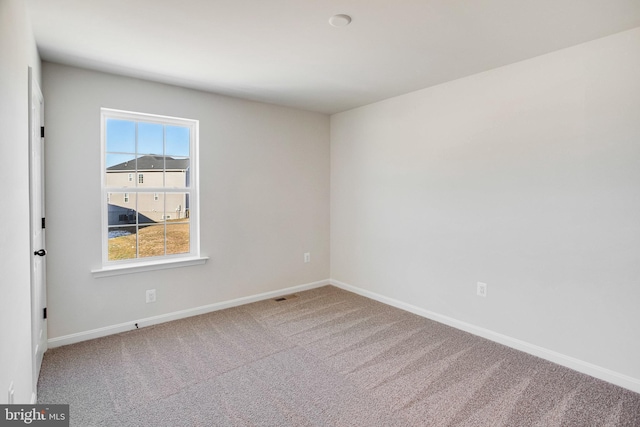 view of carpeted spare room