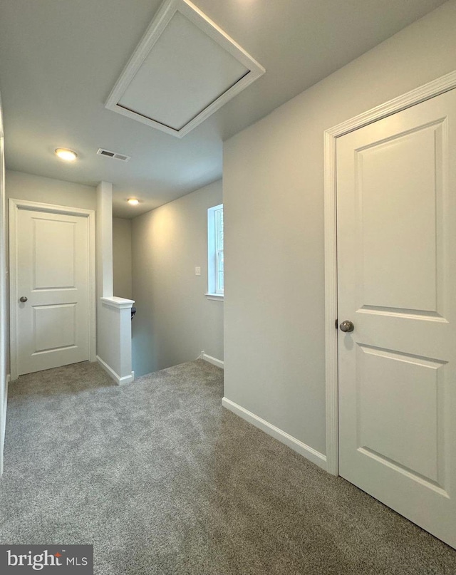 empty room with carpet flooring