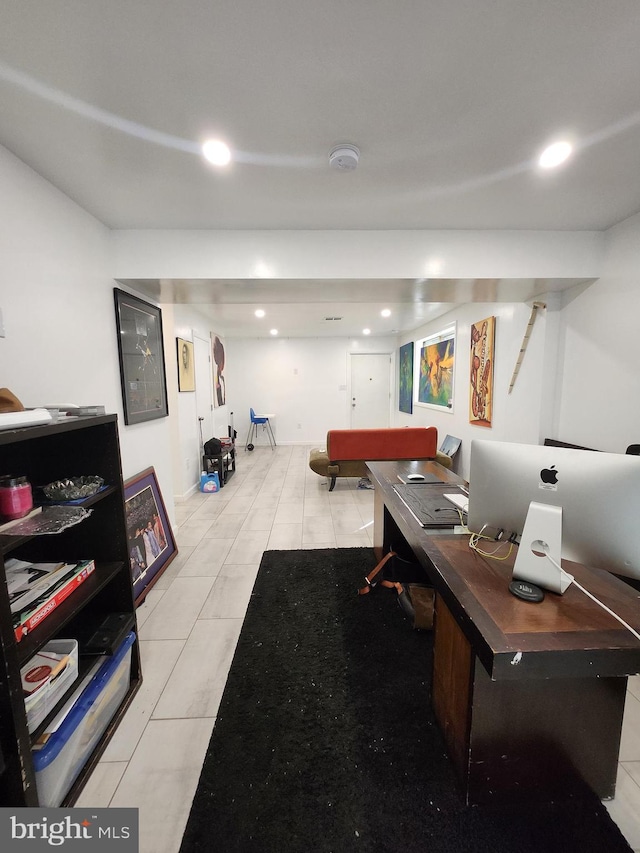 office with light tile patterned floors