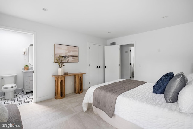 bedroom with ensuite bath