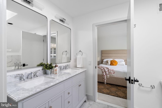 bathroom featuring tile patterned flooring and double vanity