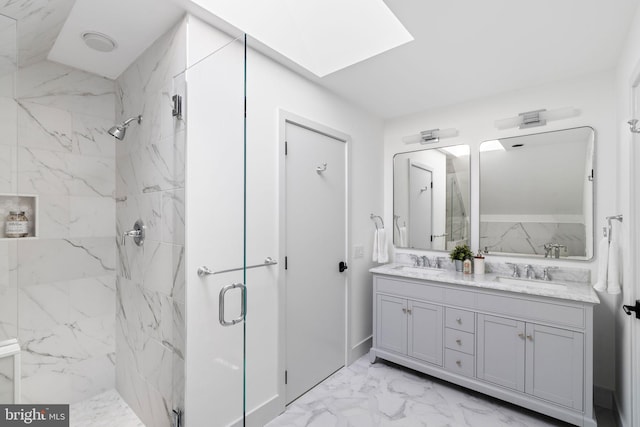 bathroom with a shower with shower door, tile patterned flooring, a skylight, and dual bowl vanity