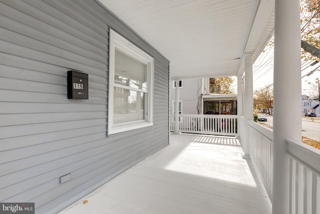 view of patio featuring a porch