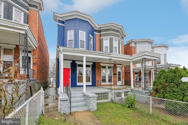 view of property with a porch