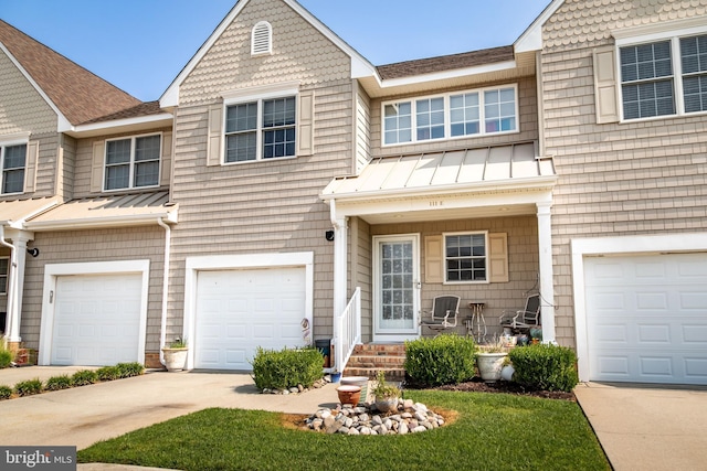 multi unit property featuring a garage