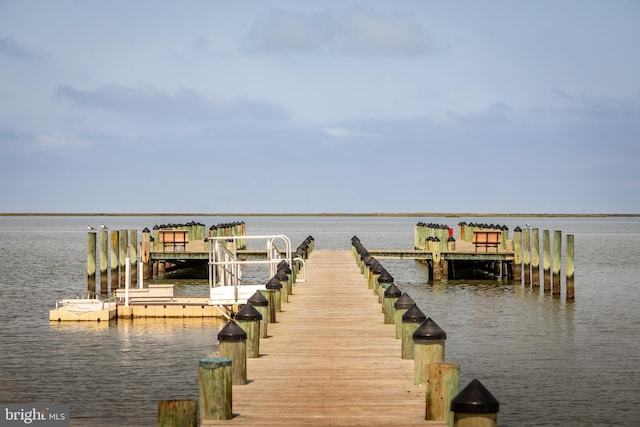 view of dock with a water view