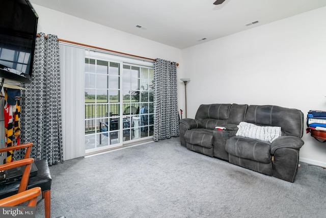 living room featuring carpet