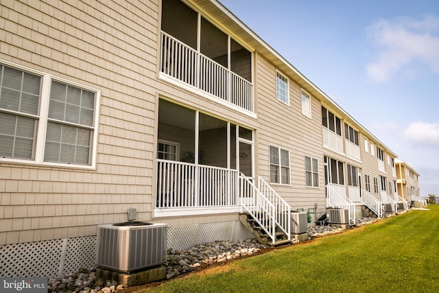 view of building exterior featuring central AC unit