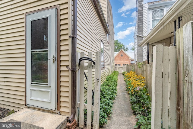 property entrance featuring fence